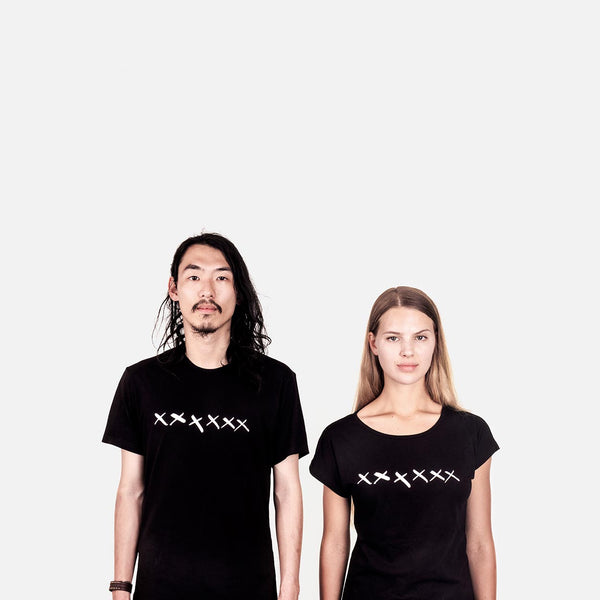 A man and woman standing side by side wearing Loyal Advocate t-shirts.