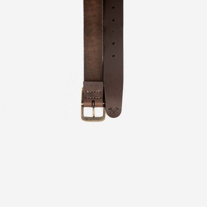 a rich brown leather belt with an aged brass buckle, etched logo and hand stitched detailing.